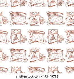 Seamless pattern with a drum and a tear-off calendar, on March 17 day.