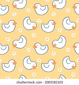 Seamless Pattern with Duck and Flower Design on Yellow Background