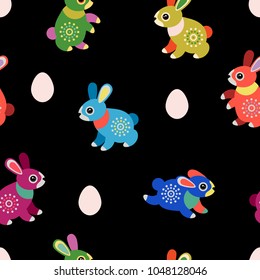 Seamless pattern. Easter bunnies and eggs. Lovely Easter card.