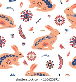 Seamless pattern of Easter bunnies with floral elements  on a white background in a ethnic style. Flat style, vector illustration.