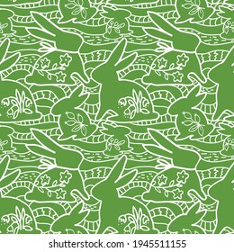 seamless pattern with easter bunnies on a green background for fabric and packaging