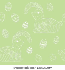 Seamless Pattern with Easter Bunny and Easter Eggs made as Doodle with Zentangle Elements. White Objects on the Light Green Background. Cute Bunny Character for Easter Holidays.