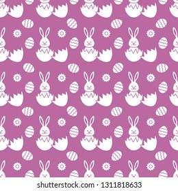 Seamless pattern with Easter Bunny looking out of an egg and decorated eggs. Happy Easter. Festive background. Design for banner, poster or print.