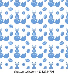 Seamless pattern with Easter Bunny looking out of an egg and decorated eggs. Happy Easter. Festive background. Design for banner, poster or print.