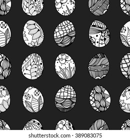 Seamless pattern with Easter eggs. Pattern for coloring book. Easter hand-drawn decorative elements in vector.  Black and white pattern.  Made by trace from sketch. Zentangle