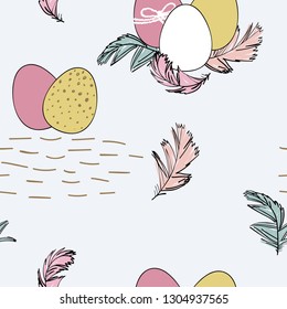 Seamless pattern with easter eggs and feathers.