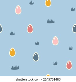 Seamless pattern with Easter eggs in the grass.