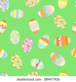 Seamless pattern of Easter eggs on a green background