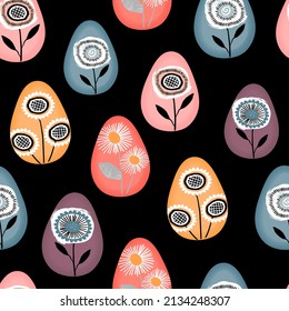 Seamless pattern with Easter eggs painted with flowers in Scandinavian style.Cartoon design elements on black.Background and texture for printing on fabrics and paper.Hand drawn vector illustration.