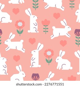Seamless pattern with Easter rabbits, flowers and hearts. Cutout colorful elements on pink background. Vector illustration