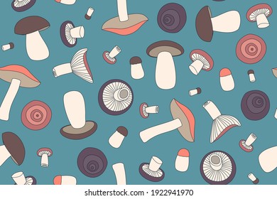 seamless pattern with edible mushrooms on a blue background, color vector illustration. hand-drawn mushrooms.