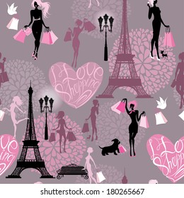 Seamless pattern - Effel Tower, hearts with calligraphic text I Love Shopping, girls silhouettes with shopping bags - Background for fashion or retail design