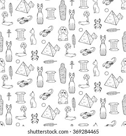 Seamless pattern with egyptean elements such as cats, sphinx, mummy, pyramids, scarabs, etc. Vector illustration