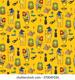 Seamless pattern with egyptean elements such as anubis, mummy, pyramids, scarabs, etc. Vector illustration