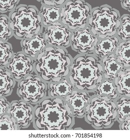 Seamless pattern. Eight-sided figures in the floral style are located chaotically. Glamorous camouflage. Gray, gray-pink.