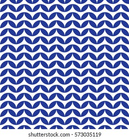 Seamless pattern of the elements of a circle of petals arranged in a row in a line deployed up and down. New trends in color blue lapis on a white background.