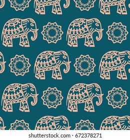 Seamless pattern with elephants and flowers. Background for textile, baby shower, greeting card, wrapping. Floral ornament.