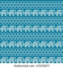 Seamless pattern with elephants and flowers. Background for textile, baby shower, greeting card, wrapping. Floral ornament.