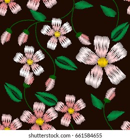 Seamless pattern of embroidery of apple flowers. Modern design of bright patterns on a dark background. Vector illustration.