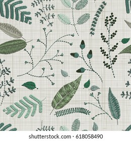 seamless pattern. Embroidery floral elements, leaves, twigs, berries, flowers, meadow. Floral wall art embroidery home decor. Set of hand drawn doodles design elements. Linen cloth texture. Colorful