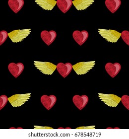 Seamless pattern from embroidery hearts and wings. Vector wallpaper for textile prints on black background.