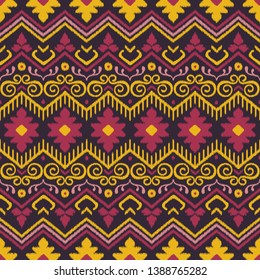 Seamless pattern with embroidery. Ikat Fabric. Ethnic design for clothing, carpet, wallpaper, etc.