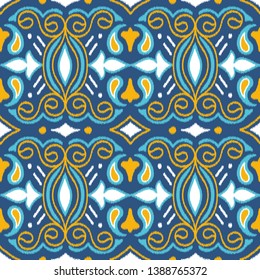 Seamless pattern with embroidery. Ikat Fabric. Ethnic design for clothing, carpet, wallpaper, etc.