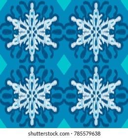 Seamless pattern. Embroidery with white snowflakes on a blue background.  Vector illustration.