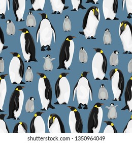 Seamless pattern. Emperor penguins and their chicks in different poses on a blue background. Realistic birds of the Antarctic. Vector for packaging, paper, prints and cards