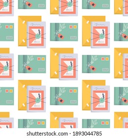 Seamless pattern with envelopes and stamps. Icon for delivery letter, correspondence, postal service. Hand made gift or present with craft paper letter, ribbon, branch and decor elements. flat vector