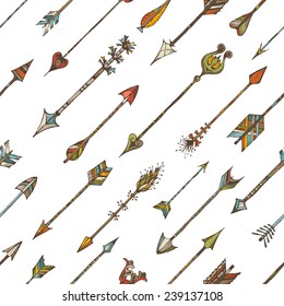 Seamless pattern of ethnic arrows. Hand-drawn various arrows on white background.