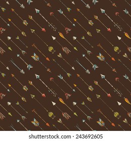 Seamless pattern of ethnic arrows. Hand-drawn various arrows on brown background.