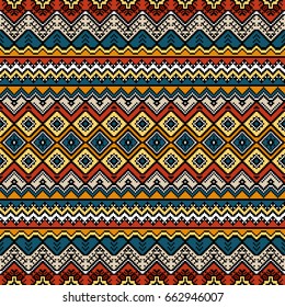 Seamless pattern with ethnic aztec motives. Bright colored abstract wallpaper in boho style.
