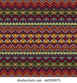 Seamless pattern with ethnic aztec motives. Bright colored abstract wallpaper in boho style.