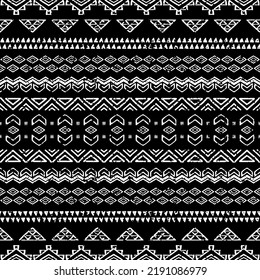 Seamless pattern with ethnic aztec ornament of hand drawn elements. Tribal stylized black and white geometrical print template with shabby texture.