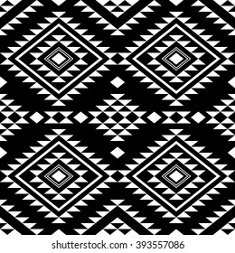 Seamless pattern with ethnic aztec ornament. Abstract wallpaper in boho chic style. Black and white.