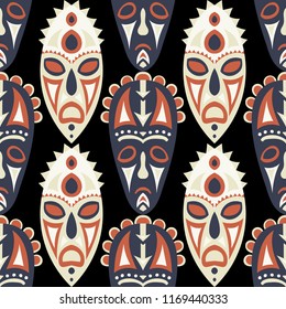 Seamless Pattern. Ethnic Seamless Background with Ritual Masks for Card or Poster. Ethnic Seamless Background with Color Trible Ritual Masks for your Design. Vector Texture.