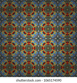 Seamless pattern ethnic design in blue, yellow and brown colors. Geometric background with tribal tiles. Vector textile print for bed linen, jacket, package design, fabric and fashion concepts.