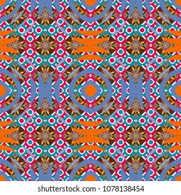 Seamless pattern ethnic design in orange, blue and pink colors. Geometric background with tribal tiles. Vector textile print for bed linen, jacket, package design, fabric and fashion concepts.