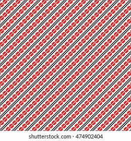 Seamless pattern with ethnic geometric abstract ornament. Cross stitch slavic embroidery motifs. Decorative elements in traditional red and black colors on white background. Vector illustration.