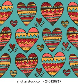 Seamless pattern of ethnic hearts isolated on blue background.Vector illustration. Decorative elements for cards, gifts, crafts on st. Valentines day