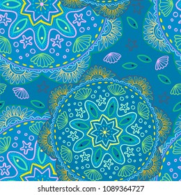Seamless pattern. Ethnic mandala with decorative ornament, doodle fishes, wind. Vector illustration