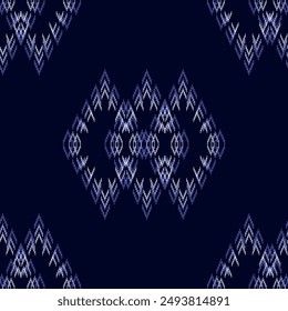 Seamless pattern ethnic motifs ikat geometric fabric
