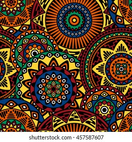 Seamless pattern with ethnic motives. Mandala stylized print template for fabric and paper.