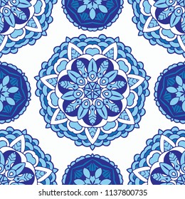 Seamless pattern in ethnic oriental style. Hand drawn vector background. Blue and white colors ornament of mandalas for design of fabric, invitation, template cards, ceramic tiles and  wrap