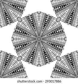 Seamless pattern in ethnic style. Black and white geometric symmetry hand drawn ornament. Boho, oriental, vintage style. Vector pattern