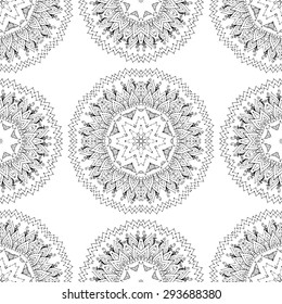 Seamless pattern in ethnic style. Black and white geometric symmetry hand drawn ornament. Boho, oriental, vintage style