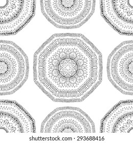 Seamless pattern in ethnic style. Black and white geometric symmetry hand drawn ornament. Boho, oriental, vintage style