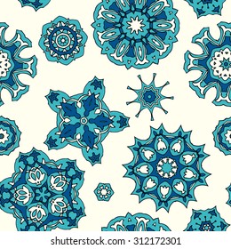 Seamless pattern in ethnic style. Floral  circle ornament. 
Vector illustration.