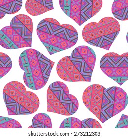Seamless pattern with ethnic style hearts, vector illustration